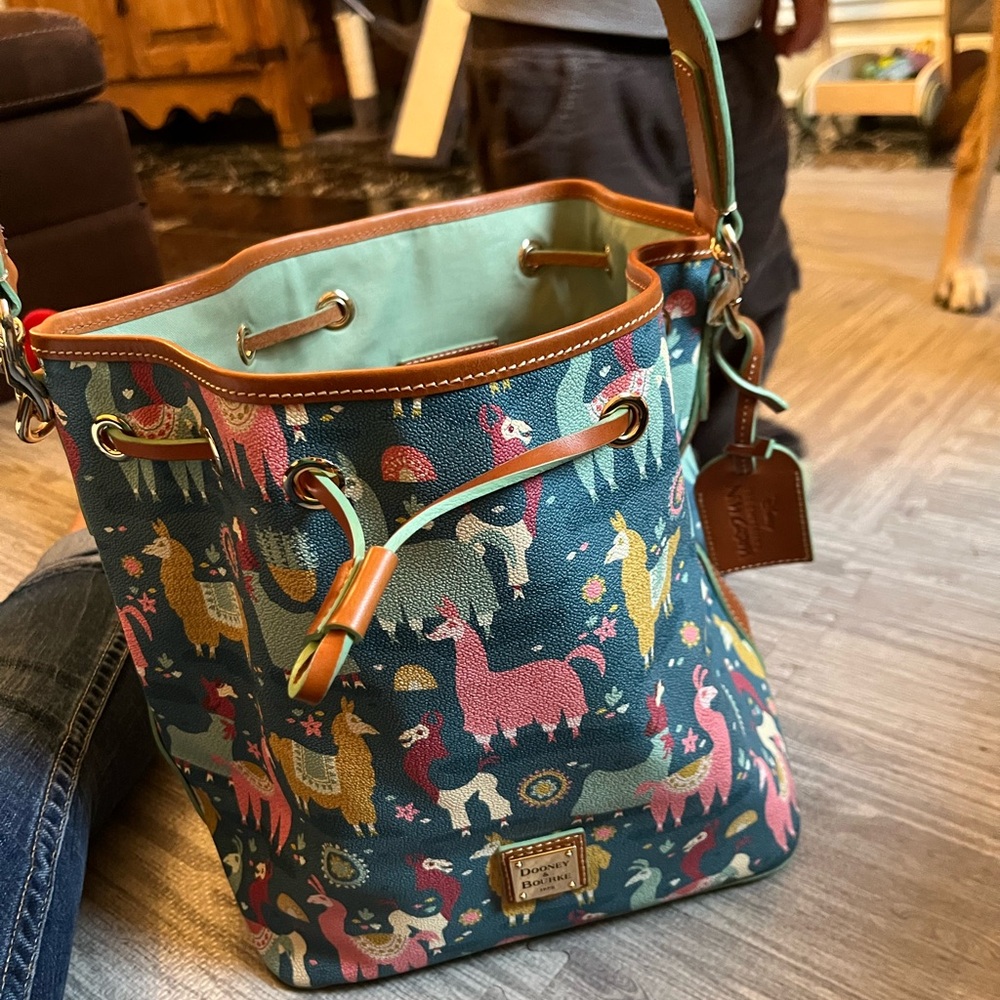 Dooney & Bourke Blue Llama Print Bucket Bag